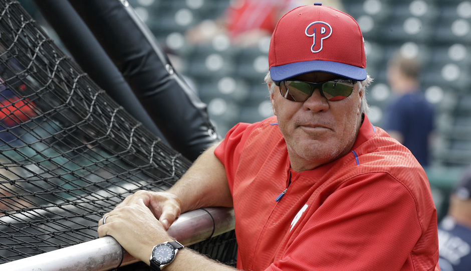 Philadelphia Phillies manager Pete Mackanin watches batting practice before a spring training baseball game against the Atlanta Braves, Thursday, March 24, 2016, in Kissimmee, Fla. (AP Photo/John Raoux)