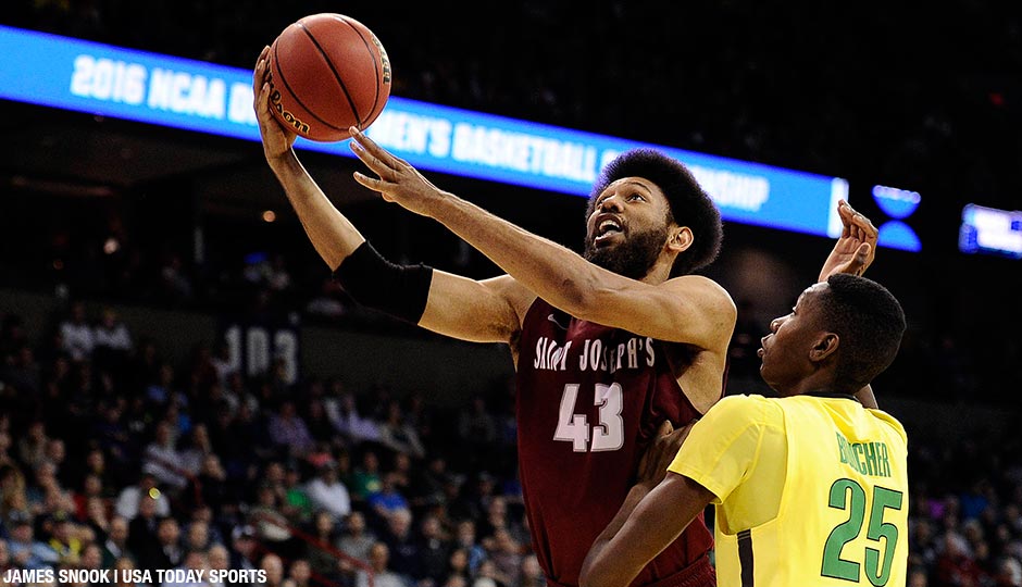 St. Joseph's Hawks forward DeAndre Bembry moves to the basket against Oregon Ducks forward Chris Boucher during the second half of their second-round matchup in the 2016 NCAA Tournament at Spokane Veterans Memorial Arena.