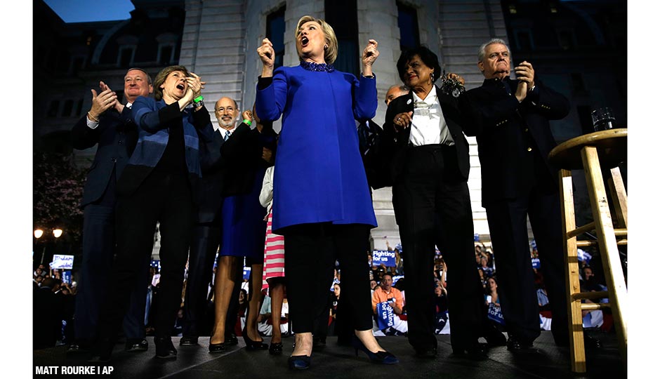 Democratic presidential candidate Hillary Clinton stands with Pennsylvania elected officials during a campaign stop, Monday, April 25, at City Hall.
