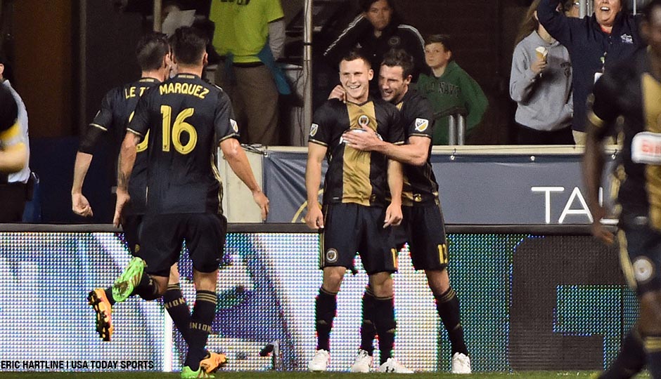 Keegan Rosenberry (center) celebrates his goal with forward Chris Pontius (13) and defender Richie Marquez (16) against the Los Angeles Galaxy during the second half at Talen Energy Stadium on May 11th. 