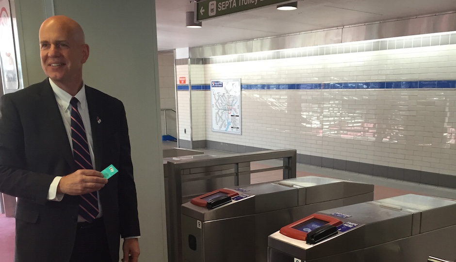 Jeff Knueppel, SEPTA general manager, uses a SEPTA Key for the first time at City Hall.