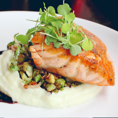 Pan Seared Salmon with cauliflower puree, bacon, brussels sprouts, and port wine gastrique