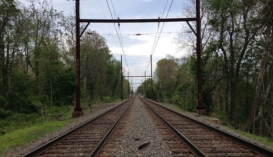 Overhead wires and steel rails expand as they get hotter. So when the temperatures get too hot, SEPTA orders its Regional Rail trains to go slow. | Photo of West Trenton Line by Famartin via Wikimedia Commons, licensed under CC-BY-SA-3.0
