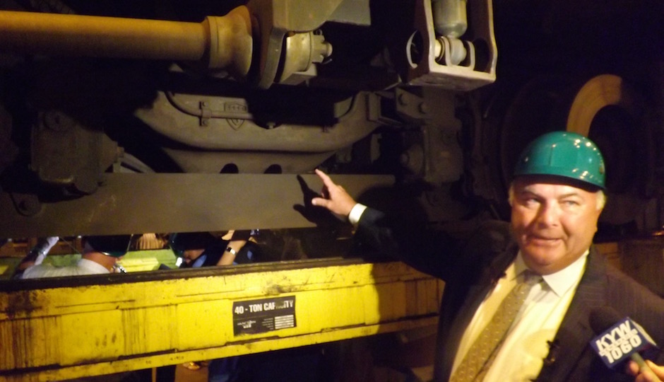 SEPTA Assistant GM for Operations Ron Hopkins describes how the equalizer bar (gray bar at left center in photo) is mounted onto the truck of a Silverliner V. | Photos: Sandy Smith