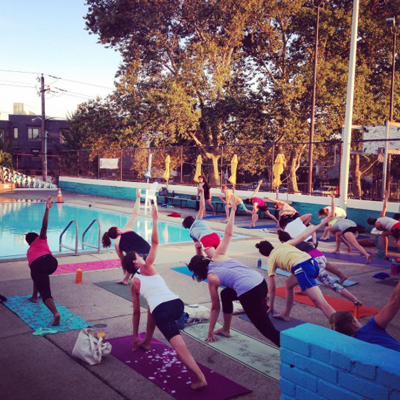 Poolside yoga at Francisville pop-up pool | Photo via Instagram. 