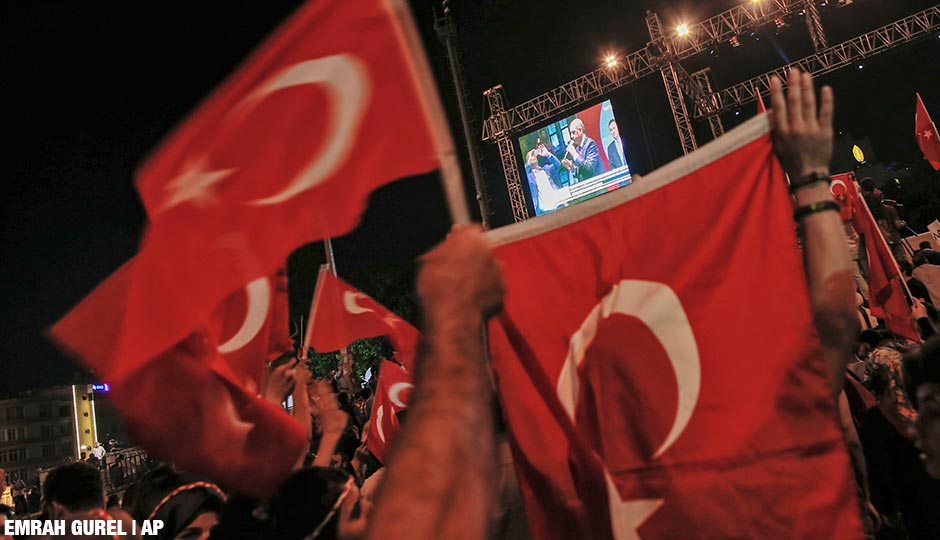 People gathered in Taksim Square in Istanbul to protest against the attempted coup, watch a pre-recorded video message by Turkish President Recep Tayyip Erdogan, early Tuesday, July 19, 2016. 