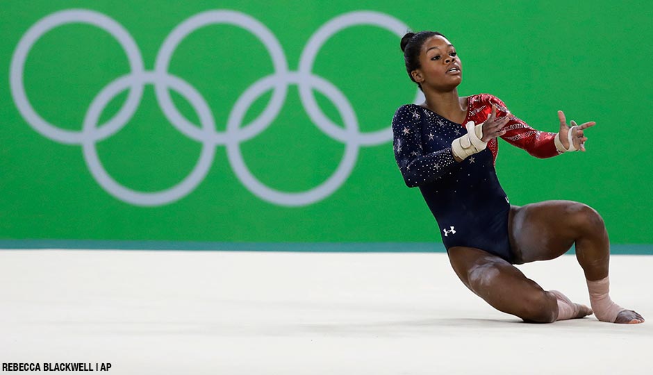 Gabrielle "Gabby" Douglas performs on the floor during the artistic gymnastics women's qualification at the 2016 Summer Olympics in Rio de Janeiro, Brazil. 