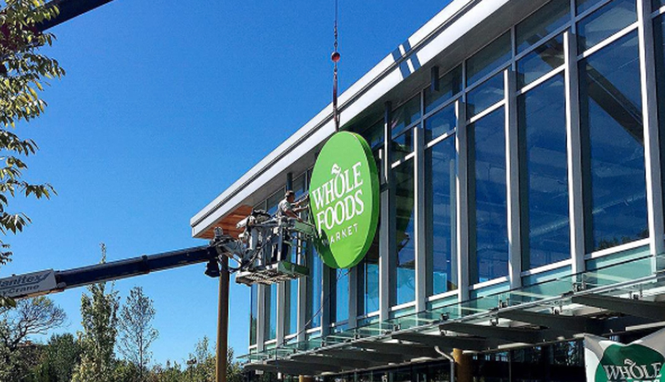 Whole Foods sign going up at new Wynnewood store | Photo via Instagram 