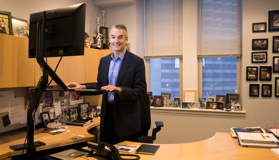 Marc Brownstein at his standing desk. Photo courtesy of the Brownstein Group. 