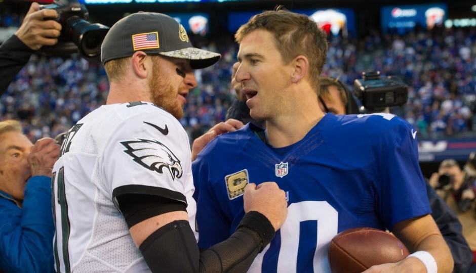 Carson Wentz and Eli Manning. (USA Today Sports)