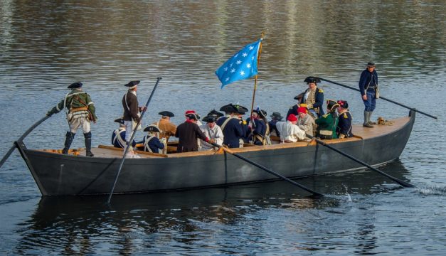History buffs get into the spirit of the season when they witness Washington Crossing the Delaware River, a re-enactment staged at Washington Crossing Historic Park on Christmas Day. Photo by R. Kennedy for Visit Philadelphia 