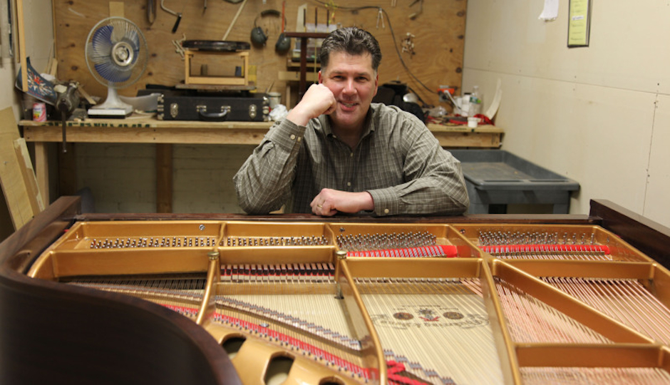 Cunningham Piano co-owner Rich Galassini in the company's Germantown restoration facility. 