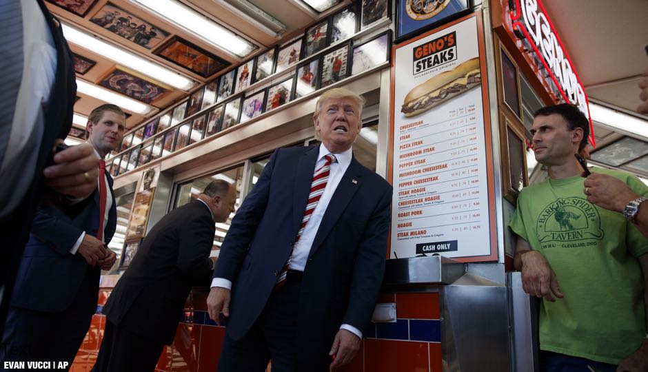 Republican presidential candidate Donald Trump talks with customers during a visit to Geno's Steaks, Thursday, Sept. 22, 2016, in Philadelphia | AP Photo/ Evan Vucci
