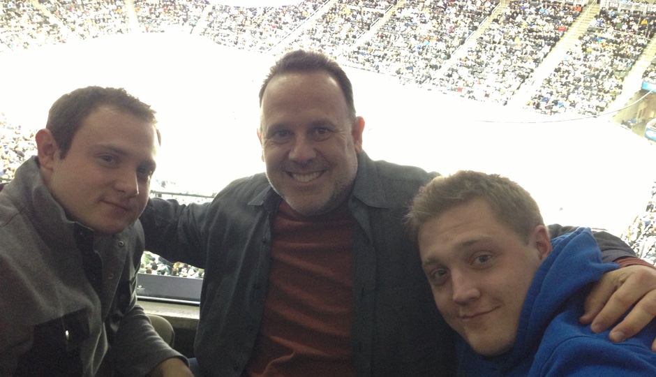 David Bookspan and his sons Ethan Bookspan (right) and Jesse Bookspan (left) at a Pittsburgh Penguin/Philadelphia Flyers hockey game in Pittsburgh.