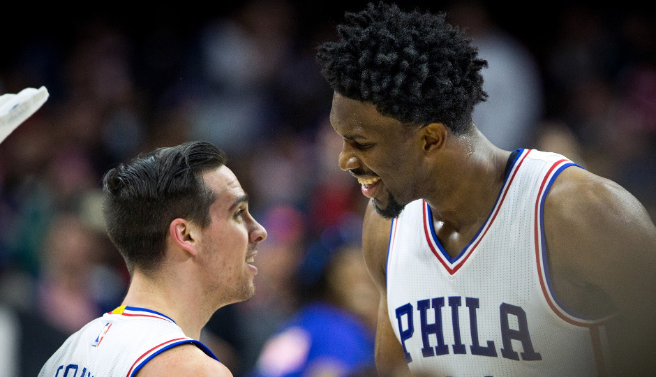 Sixers center Joel Embiid celebrates with T.J. McConnell after McConnell's game-winning shot gave the Sixers a 98-98 victory | Bill Streicher-USA TODAY Sports