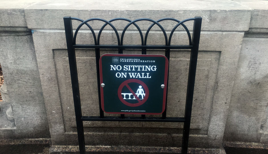 ban on Wall sitting at rittenhouse sign