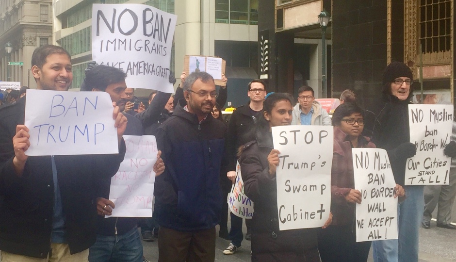 Comcast employees protest Trump's immigration ban. 