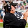 Eagles Coach Chip Kelly signals play on field