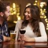 Couple enjoying drinks on a first date