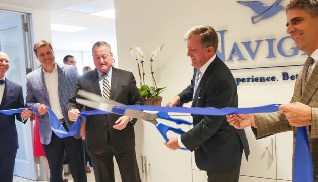 Mayor Kenney cuts the ribbon with CEO Rob Kathol at Navigate's new Center City satellite office. 
