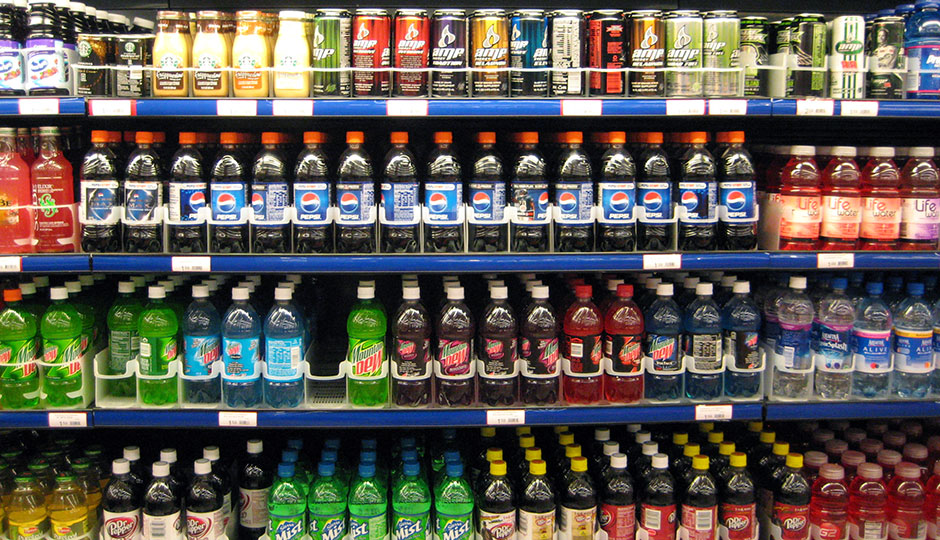 Sodas for sale in a refrigerated case