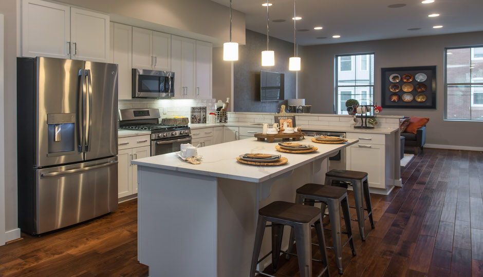 The open floor plan kitchen is completely modern.