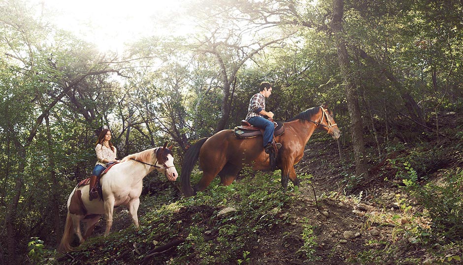 At Travaasa, guests can try their hand at horseback riding. Photo via istockphoto