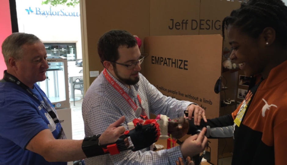 Mayor Kenney at the 2017 SXSW Social Hub testing Jefferson University's 3D printed hands. 