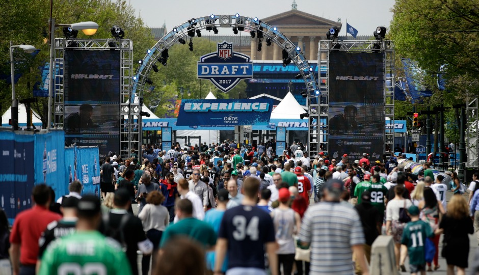 Fans arrive ahead of the 2017 NFL football draft, in Philadelphia, Thursday, April 27, 2017. (AP Photo/Matt Rourke)