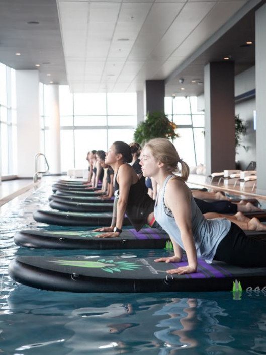 We Did Stand-Up Paddle Board Yoga in a Sky-High Infinity Pool