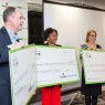 holding-giant-checks