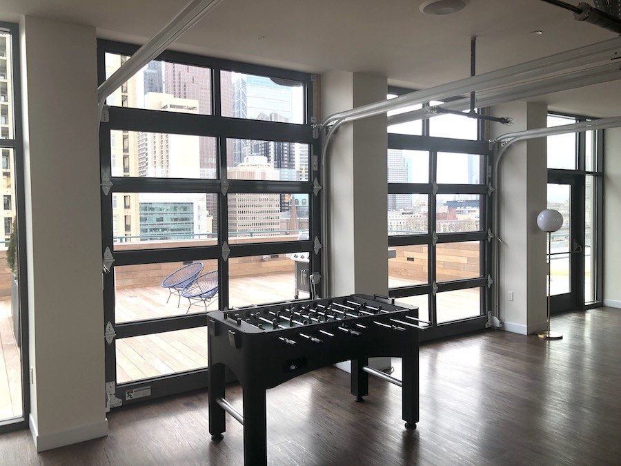 sixteen hundred lofts tour lounge garage doors and deck