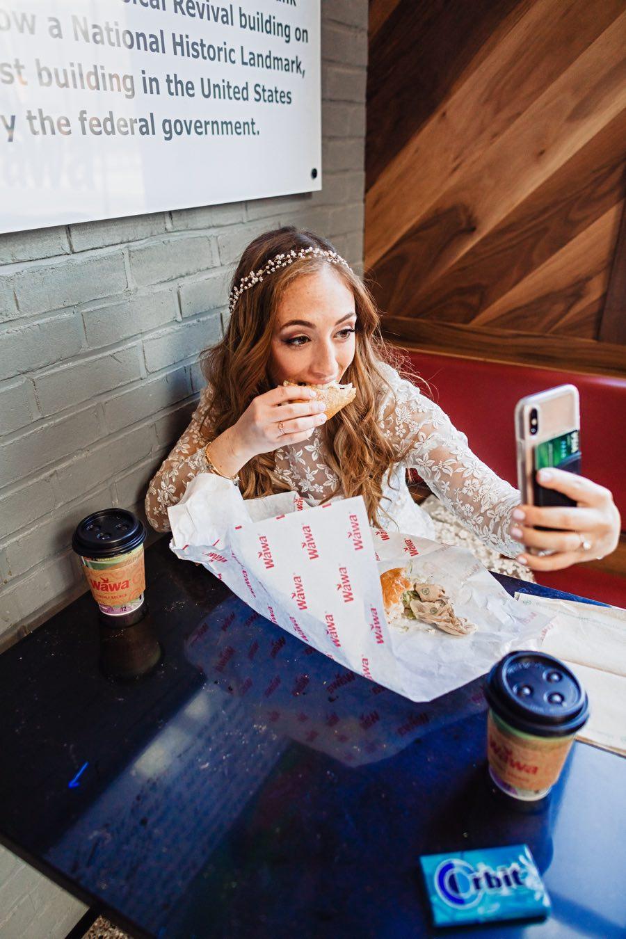 bride eating wawa hoagie