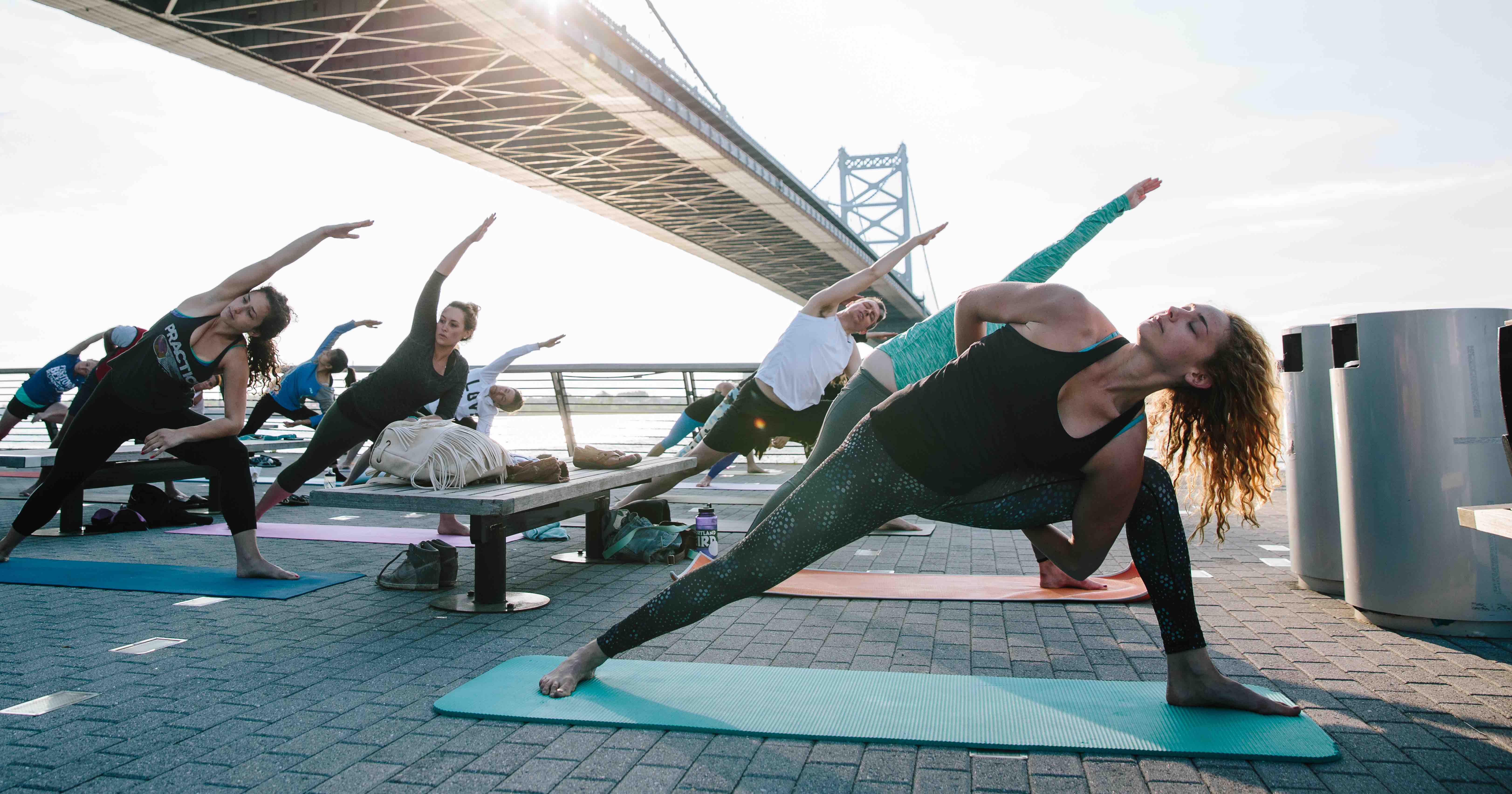 Free Yoga On The Pier Is Returning to the Philly Waterfront