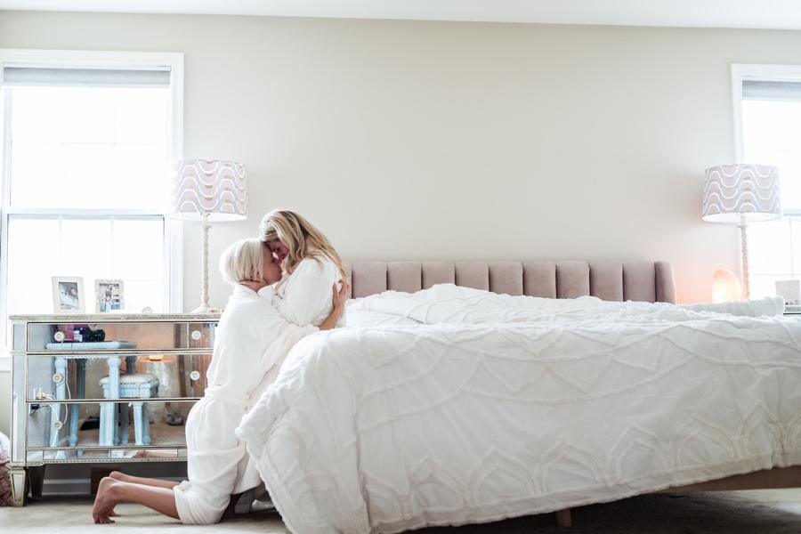 same-sex marriage proposal at home in robes