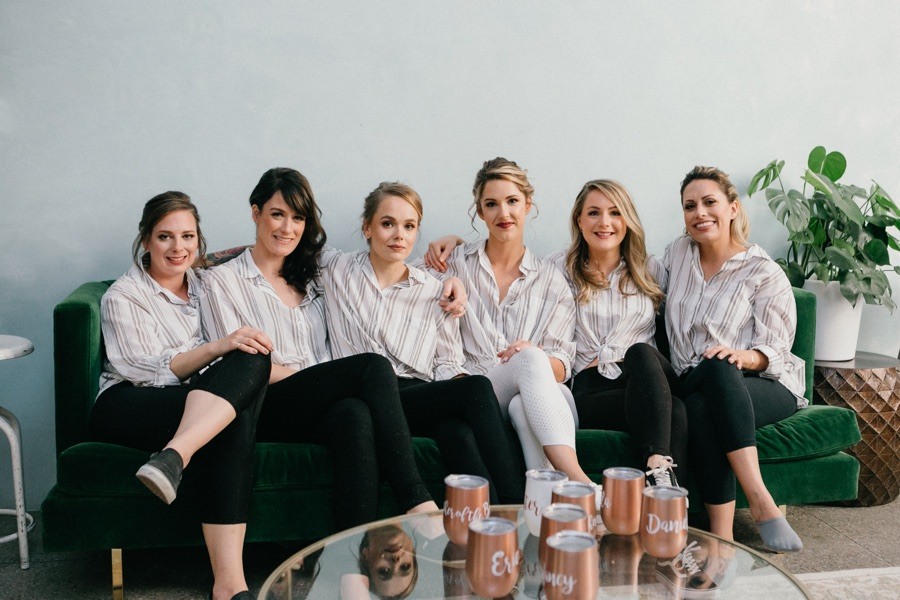 Bride and bridesmaids getting ready