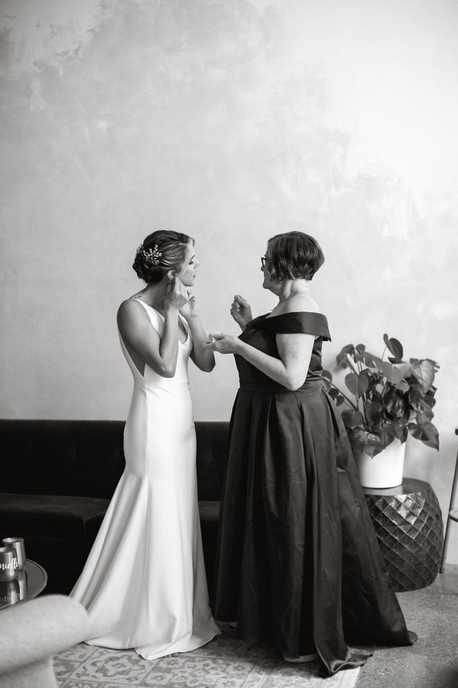 Bride and mother getting ready