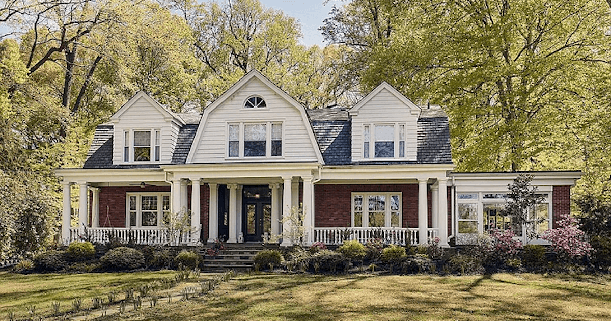 dutch colonial house with porch