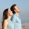 relaxed couple breathing