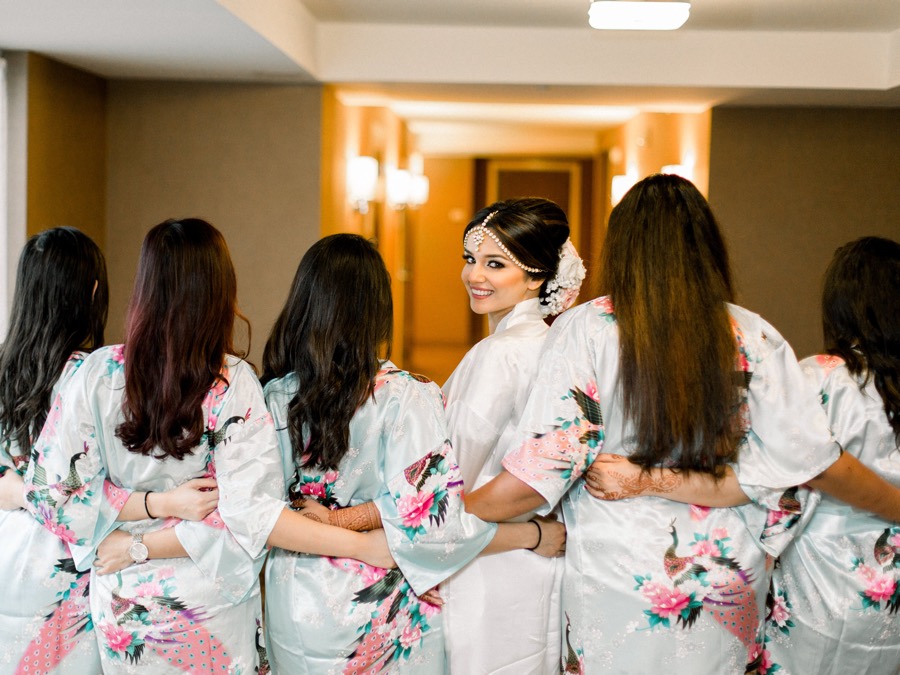 Bride and bridesmaids getting ready