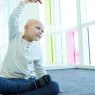 CHOP patient Cameron doing yoga