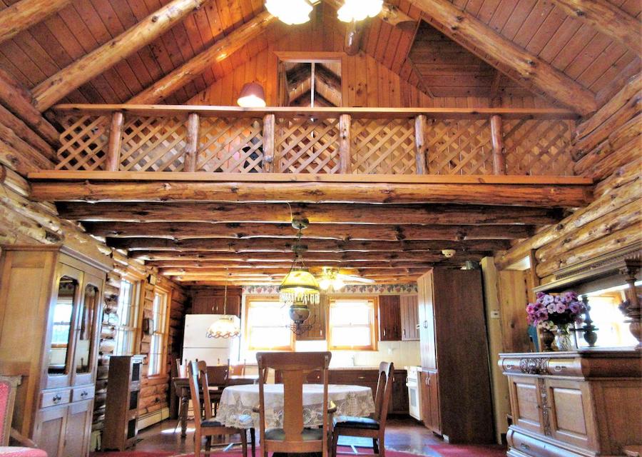 house for sale schwenksville log house dining area and bedroom balcony