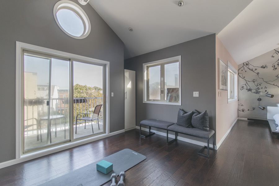 northern liberties designer townhouse master bedroom sitting area and balcony