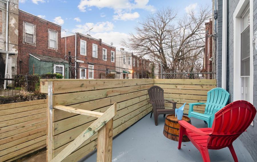 cobbs creek renovated corner rowhouse rear deck