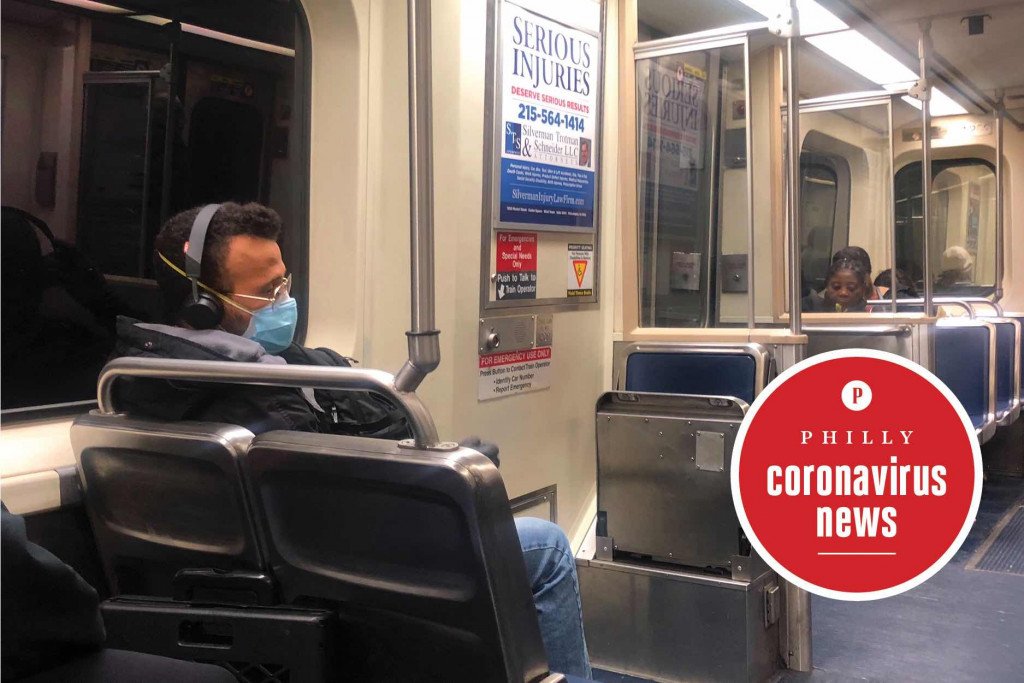 man wearing a face mask on a septa train during the philadelphia coronavirus scare