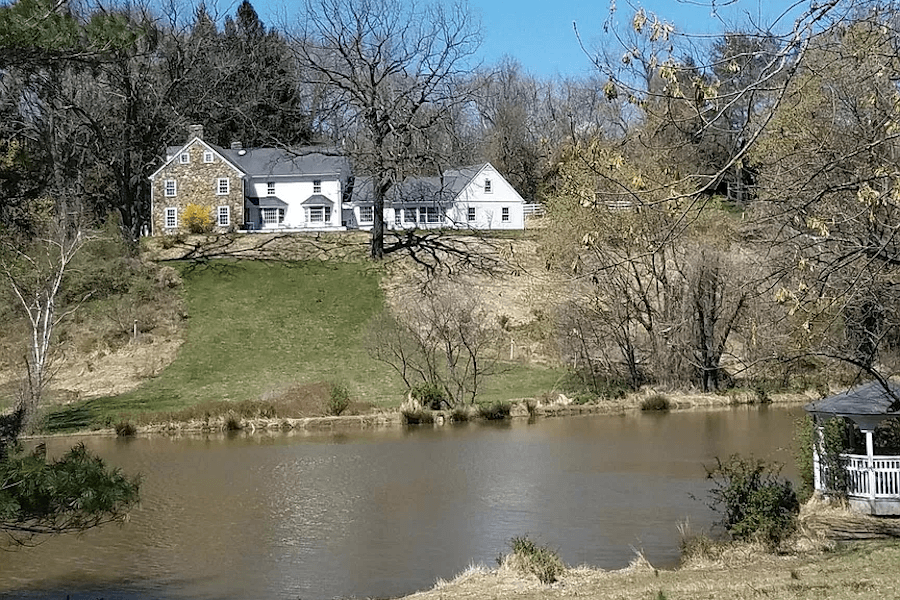 side elevation from across pond