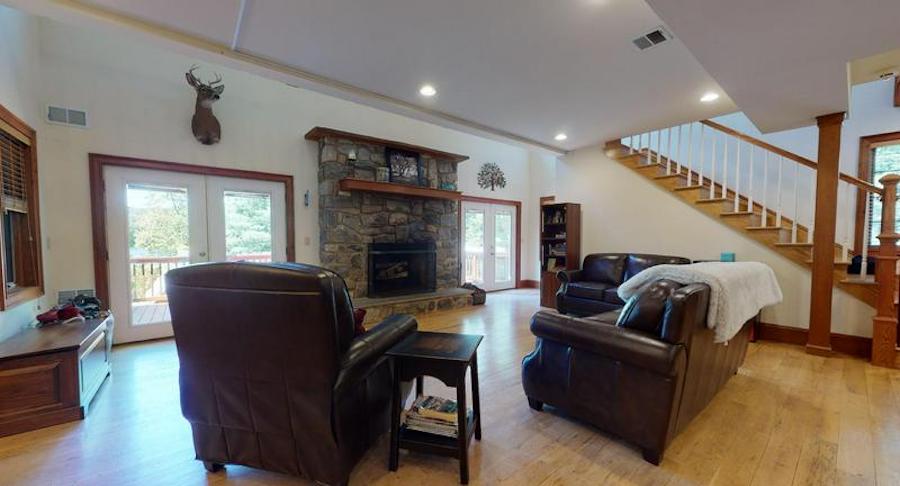 That’s because this house has all the modern creature comforts along with plenty of space for socially distant relaxation and entertaining, starting with the totally open main-floor living area.living room