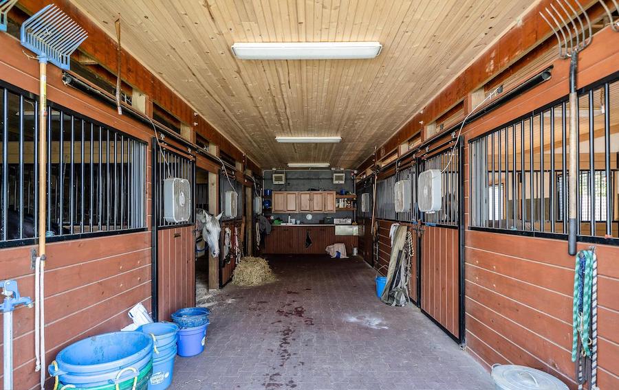 Horse stalls in barn