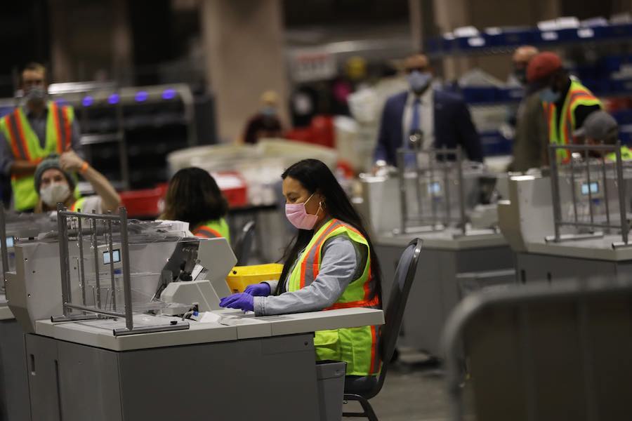 workers count the Philadelphia vote inside the Pennsylvania Convention Center, which will play a big part in the Pennsylvania election results