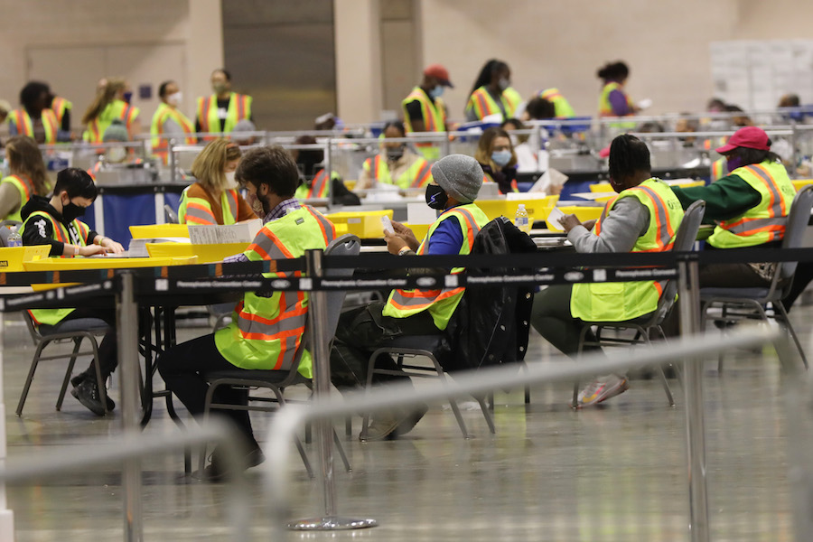 workers count the Philadelphia vote inside the Pennsylvania Convention Center, which will play a big part in the Pennsylvania election results